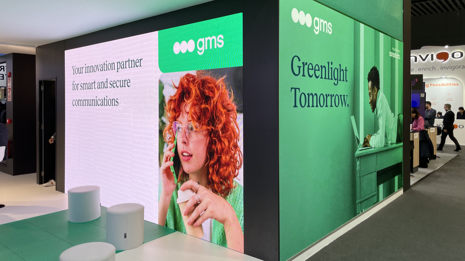 The GMS booth at Mobile World Congress 2024 showing some of its new branding